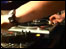A DJ no his decks