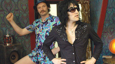 Julian Shows His Legs, Noel Poses