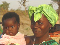 Local Gambian lady with her baby