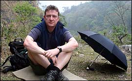 Ade with an umbrella