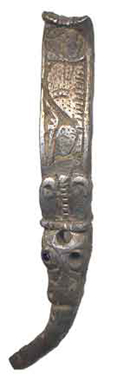 a silver Anglo-Saxon carved fitting