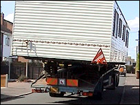 The Aston family mobile home is taken away