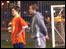Player and coach at football training