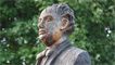 Wooden statue of Dylan Thomas