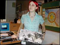 Anna Pidgeon with the remains of her car