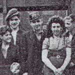 Tom Ritson (3rd right) photographed with some of the 'Lads and Lasses' in May 1946 in front of Lowca Pit shaft before setting off for the World War Two 'Victory March' (Photo used by courtesy of 'The Whitehaven News')