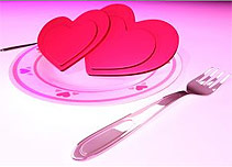Paper love hearts on a dinner plate