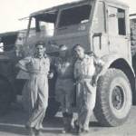 Here is a photo of me and two Pinkies next to two trucks -- the one on the right is a Foden (made in Sandbach, Cheshire) and the one on the left is a Leyland.