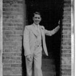 This is a photograph of me aged 21 years old. It was taken at 20 West Road, Mortlake in Surrey,which was my home. This photograph was taken at my sister, Rose's wedding to Bob May in August 1939.