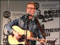 Roger performing at a gig
