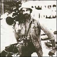 News Journalist Brian Tolfree in the field working