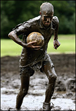 Muddy footballer