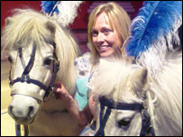 Cinderella (Alison Dormer) with two horses