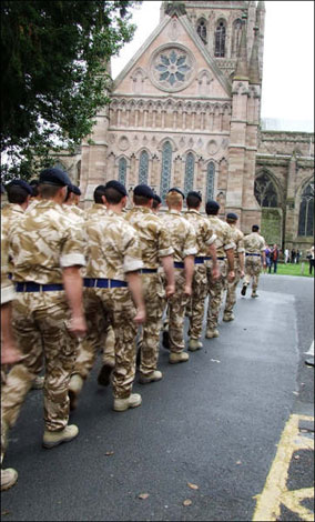 Soldiers from the 1st The Queen’s Dragoon Guards and B Company 1st Battalion, the Rifles march through Hereford. Picture by Philip Morris. 