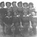 The girls from the Land Army after the Victory Day Parade. (L to R) Back: Gladys, Violet, Minnie, Phyllis, Joyce, Dorothy. Front: Ida, Megan, Winnie, Sybil Hammond