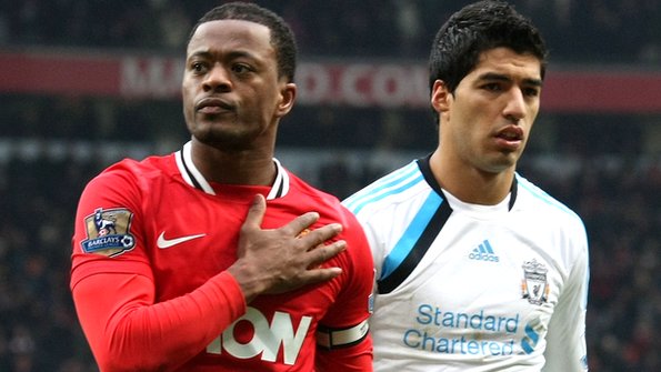 Patrice Evra and Luis Suarez