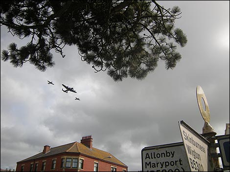 The Battle of Britain Memorial Flight's Spitfire, Lancaster and Hurricane flying over Silloth 