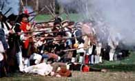 Photograph showing a reconstruction of the Redcoats and Rebels in Lexington, USA