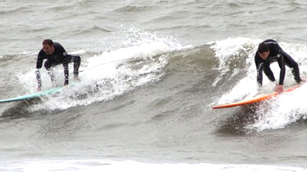 Surfers dropping in. Image by Mark Evans