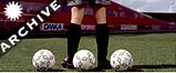 Three footballs