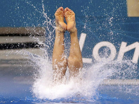 China's Cao Yuan and Zhang Yanquan win gold in the diving final