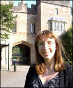 Palace Warden Sarah Duthie by the moat house