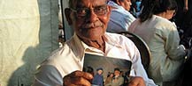 Man showing photo