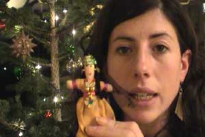 Louise is decorating her Christmas tree...