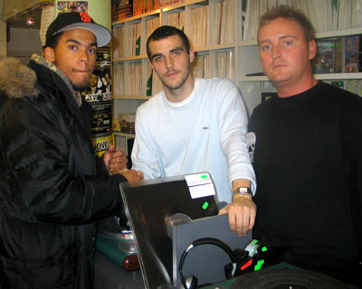 Luke and Brett from Tempest Records sort Dev out with some bits and pieces