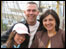Family beside a Tall Ship
