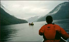 Pupils on canoe on lake in Norway 