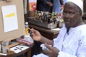 Atif is a Gambian refugee artist...