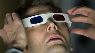 David Tennant staring in wonder with 3D specs on