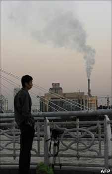 Man outside factory in China