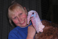 Janice Houghton-Wallace with one of her turkeys