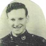 John in his blue uniform