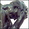 Statue of ancient man with hand on forehead in deep thought