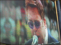 Elton John on videoscreen