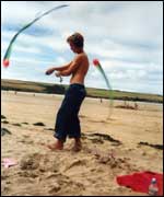 Tom Roberts practising Poi