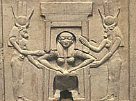 Relief showing a woman of ancient Egypt, giving birth. The goddess Hathor, protector of women during childbirth, assists on either side 