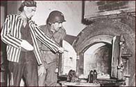 A photograph of a concentration camp crematorium