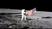 Charles Conrad Unfurls Flag
