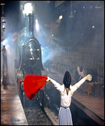 Roberta flags the train down