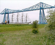 CGI showing tall ships passing under the bridge