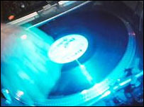 DJ on record deck