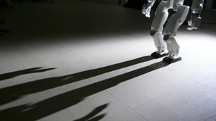 One small step for robot... a walking robot's legs cast a shadow