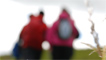 The walking group heading towards the trig point.