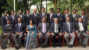 Amara Indumathie (Standing R) with officials and team mates