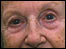 A close up of an elderly lady's face