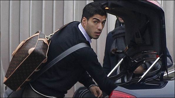 Luis Suarez arrives at Liverpool's Melwood training ground